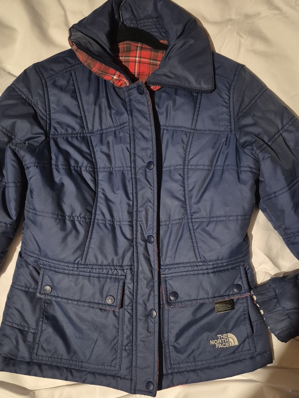The North Face Women's Navy Quilted Puffer Jacket with Plaid Trim